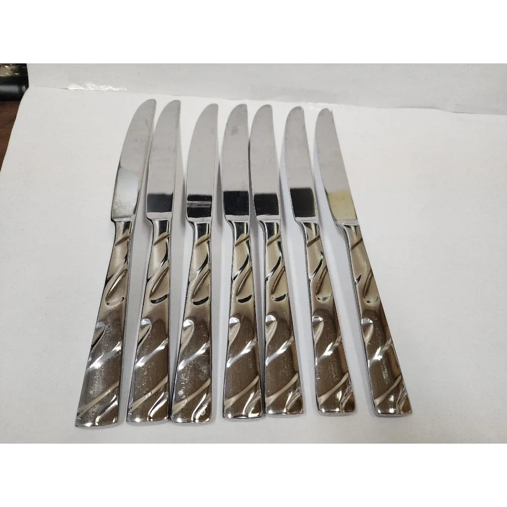 Oneida Allude Pattern Stainless Glossy Swirls Set of 7‎ Dinner Knives GUC